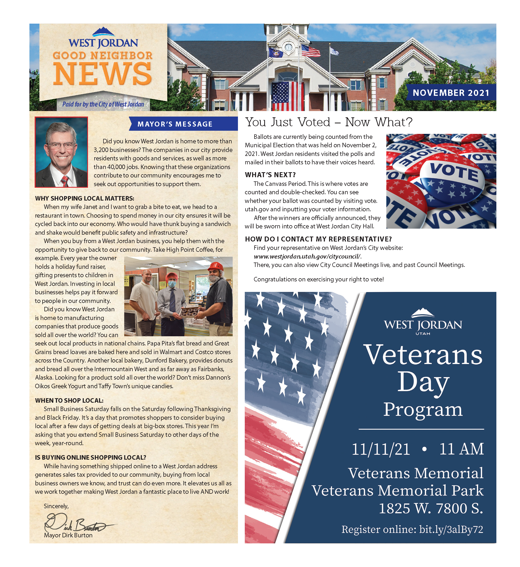 A newsletter page with articles about shopping locally, post-voting actions, and a Veterans Day program. Includes images of a voting sign, a shopping scene, and an American flag. The page features text about community events and city updates.